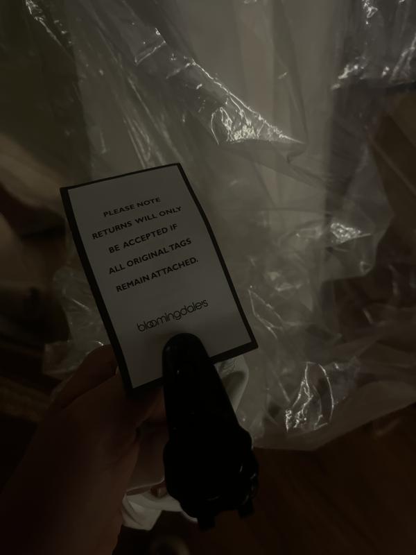 Size 2 or four of the yellow dress, Black and white dress are both size 0, this is also not a security tag