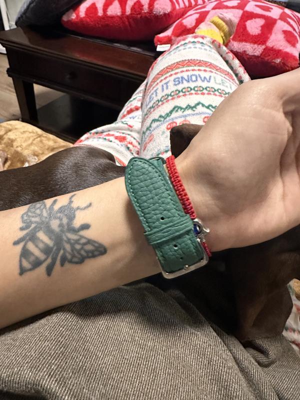 Strap is comfortable and soft, the green pops it’s a nice deep green.