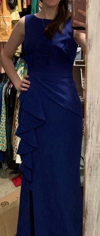 Cobalt blue color size 0 fits true to size but is very fitted and figure flattering.