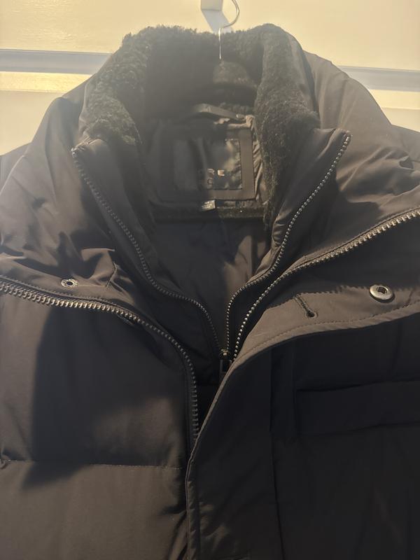 Extra layer with removal vest , fleece around the neck, good length that cover your bottom, nice thick and heavy weight.