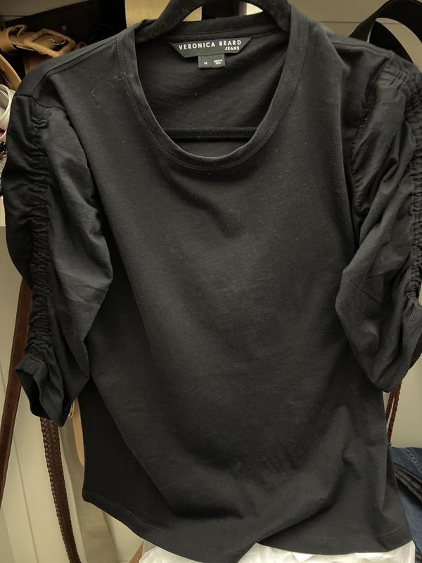 Great top with a skirt or pants