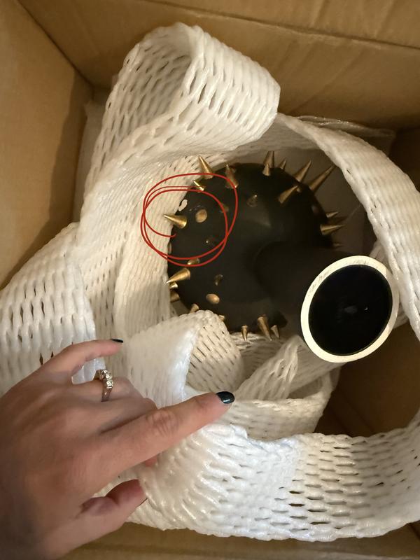 The second image shows the broken piece due to poor packaging.