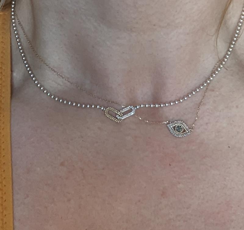 With a Meira T necklace