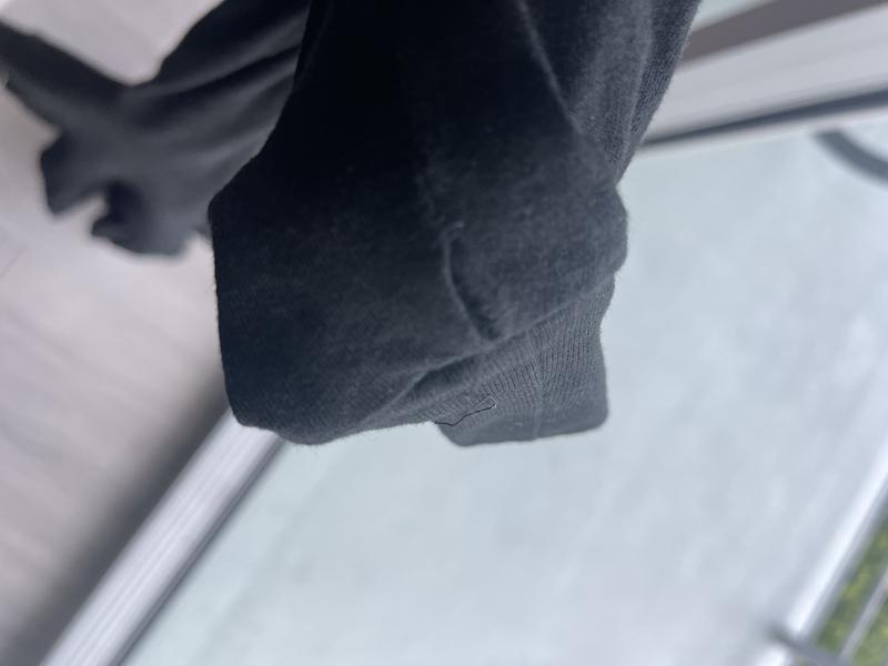 Seams detaching on sleeve.