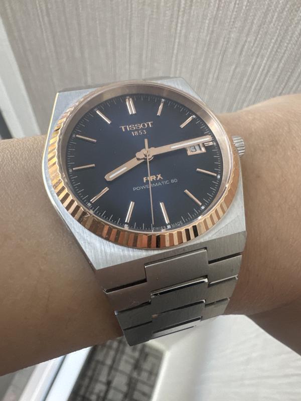 Tissot PRX gold watch