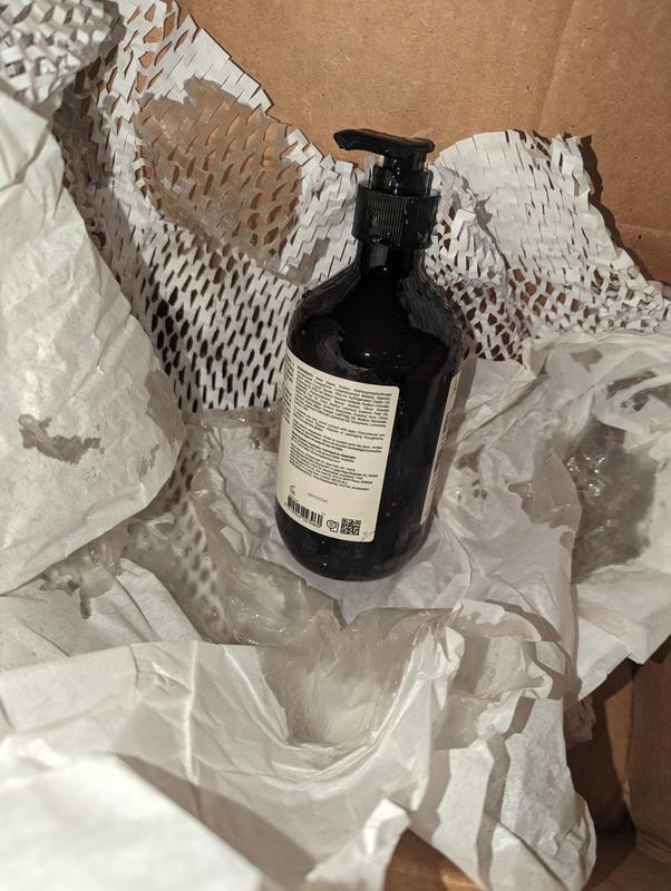 The leaked bottle straight out of the package as received.