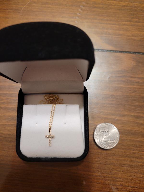 Necklace next to a nickel coin so you can see the size.