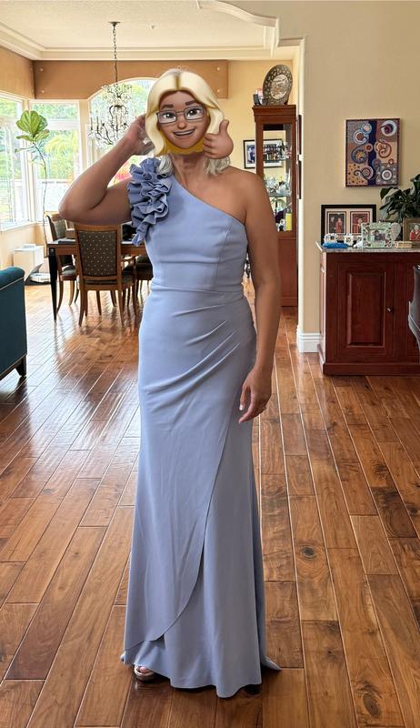 Wearing platform heels and is still long