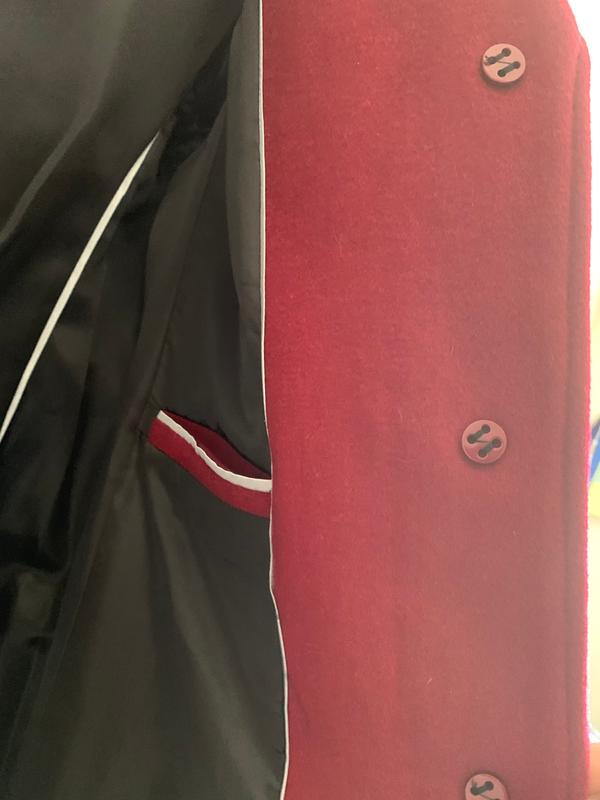 Nice size pocket on the inside, really good quality coat even has these small buttons on the inside to protect the larger on the outside.
