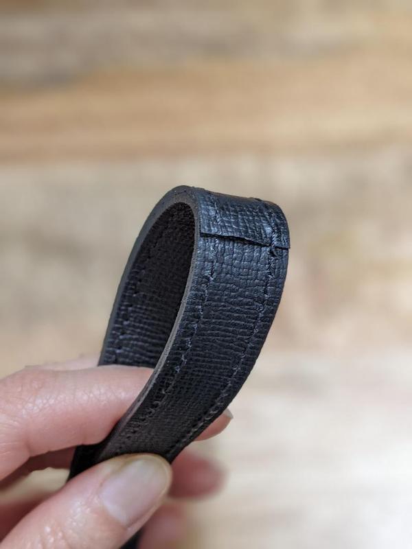 Poorly made crossbody strap