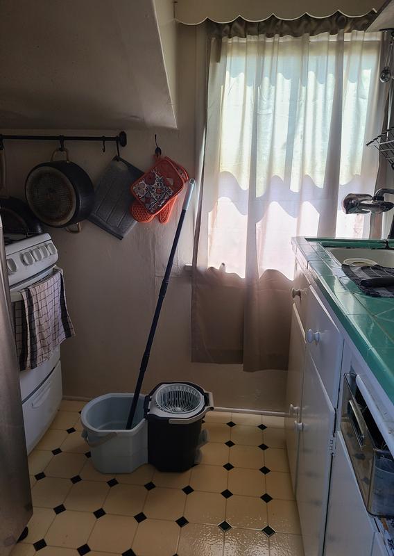 Mop in kitchen