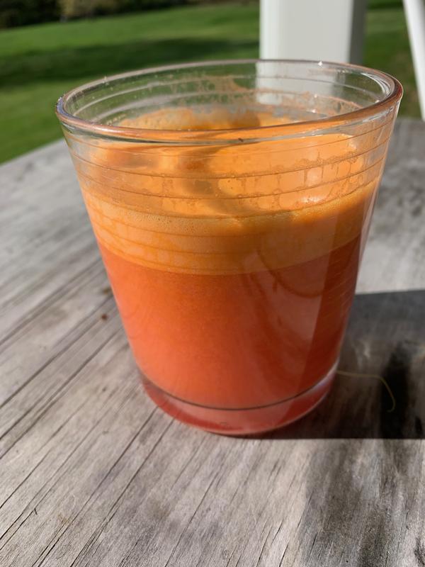 Foamy carrot-orange-ginger juice, and springtime!