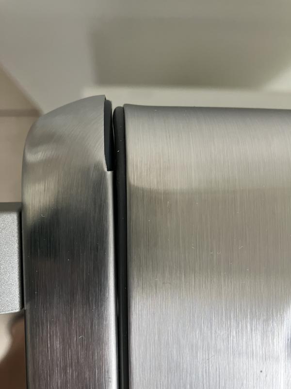 miss-aligned door. Top left corner. Manufacturing flaw.