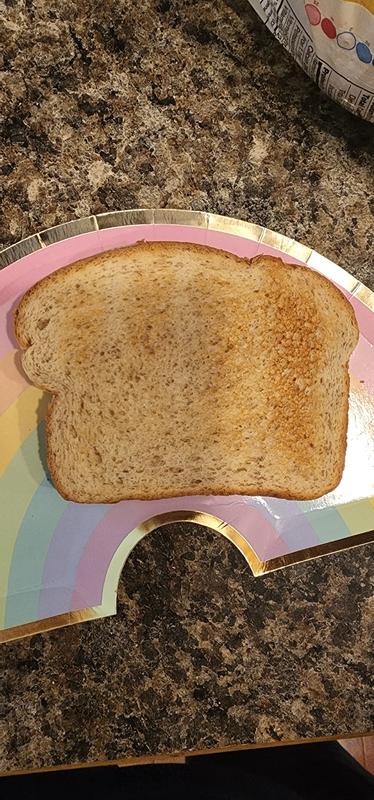 Side 1 of a thick slice of Sara Lee Artisano Bread.