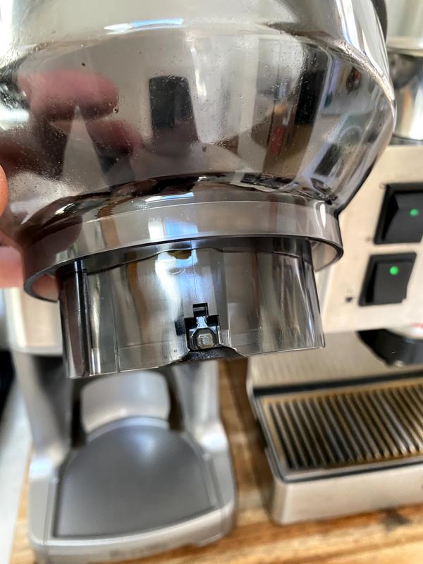 Broken plastic hopper holder