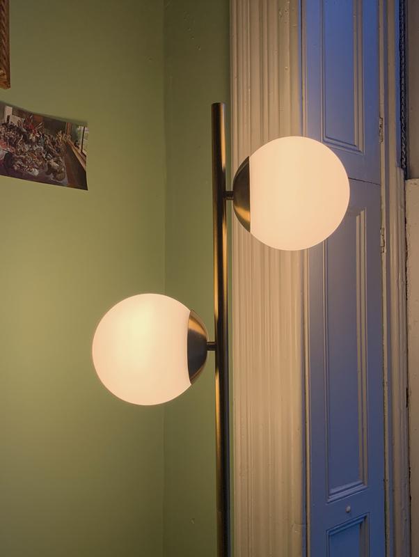 With 25w incandescent bulbs (smaller than standard to fit through opening of globes).