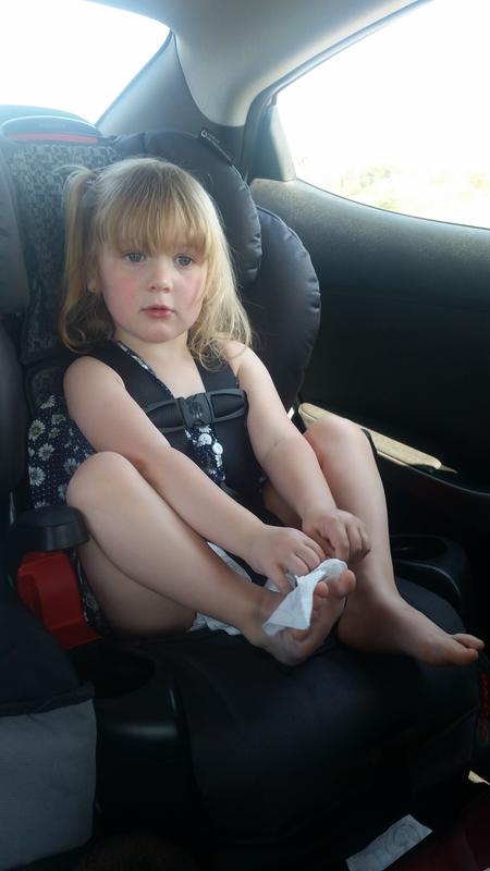 Cleaning feet in her seat :)