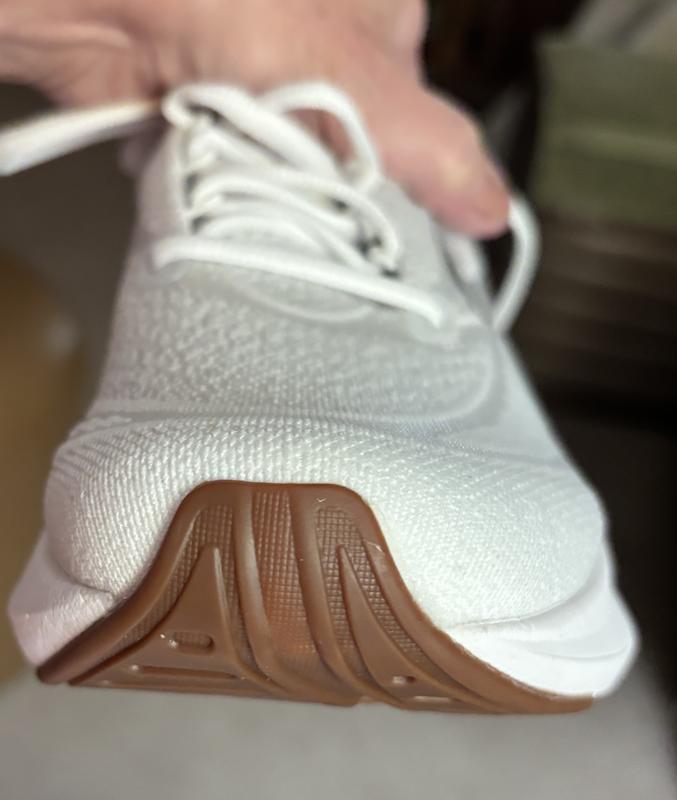 Customer photo for "Dark Brown Toe Tread on White Shoe looks strange"