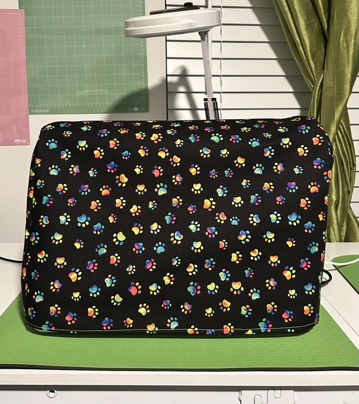 Embroidery patches and machine cover with side pocket