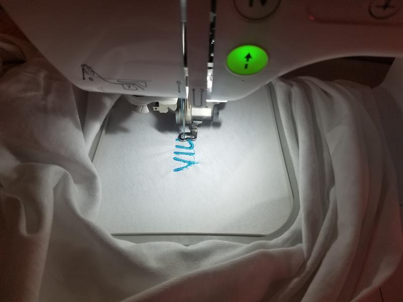 Embroidering a family name on shirt