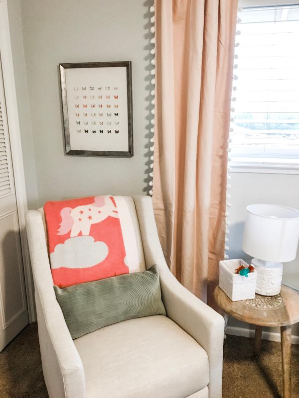 Babyletto® Toco Swivel Glider in Black/White Boucle with Ottoman Bed