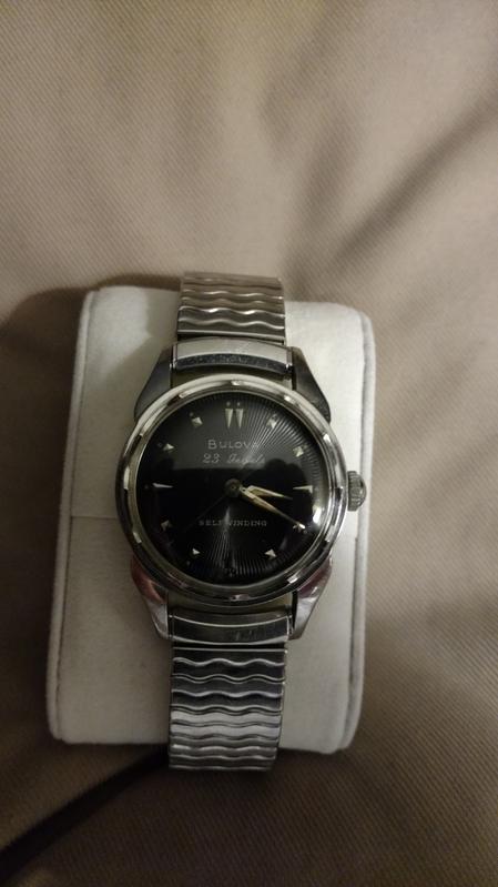 Bulova watch silver outlet with black face