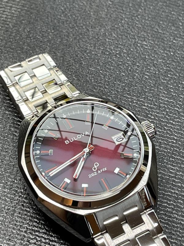 Bulova red face on sale watch