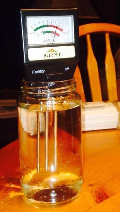 Vinegar reads right where it should. Soak it in vinegar. Wipe the probes. Then try the reading.