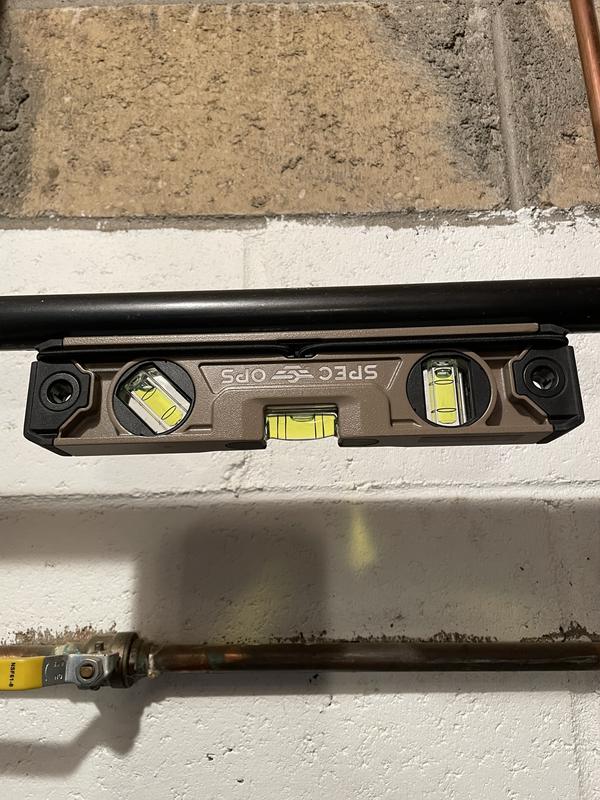 Spec Ops MagneticTorpedo Level attached to a metal gas line.