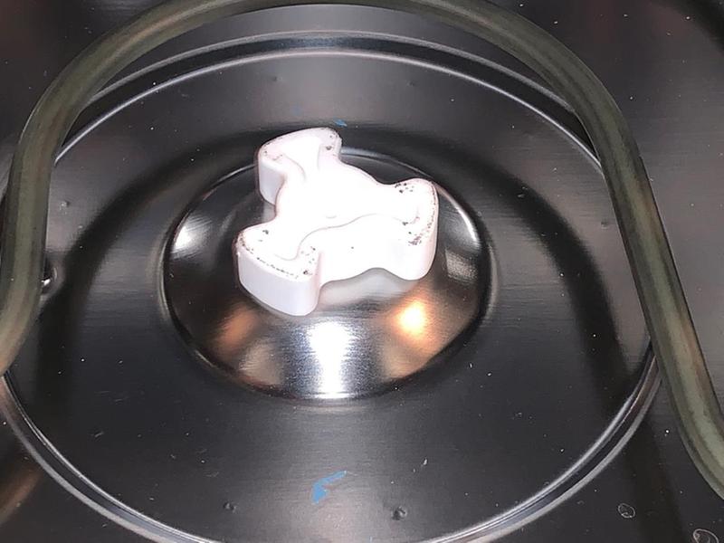 Some rubbing from the bottom of the metal tray on to the base piece.