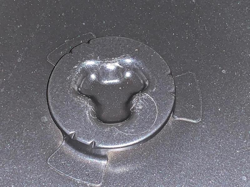 The bottom of the turntable.  You can see it's scratched up a bit already, from some jiggling on the base piece.