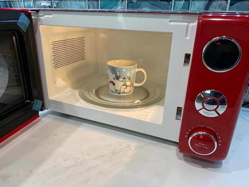 Interior of the Galanz Retro Microwave Oven with an average sized coffee cup