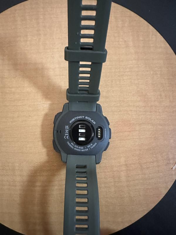 The back side of the watch. I like the charger insert better on this one rather than magnet type.