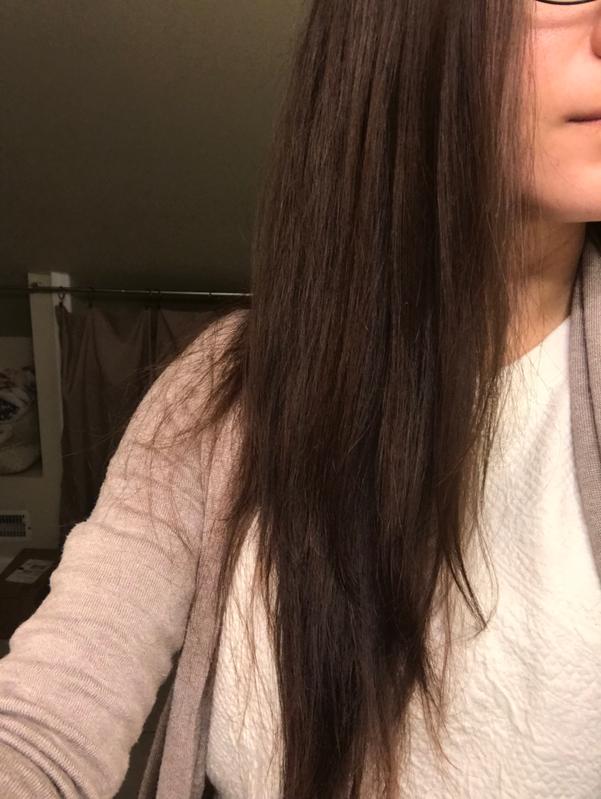 With product, blown out straight. Shiny and not frizzy