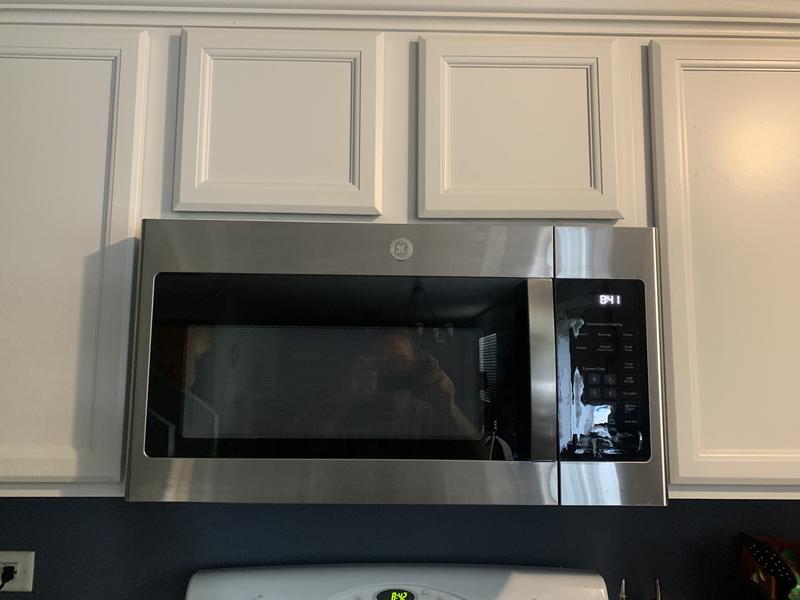 GE 1.6 cu. ft. Over the Range Microwave in Bisque