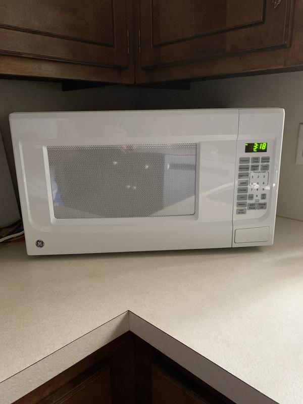 GE JES1142SJ 1.1 cu. ft. Countertop Microwave Oven with 1,100 Cooking Watts  & Child Lockout