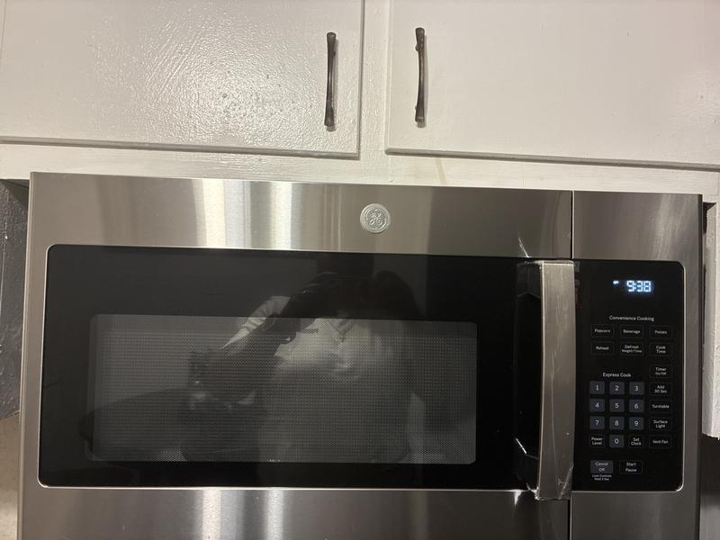 GE 1.6 cu. ft. Over the Range Microwave in Bisque