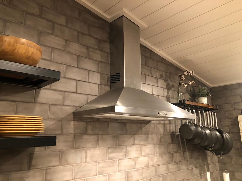 Installing range hood on deals sloped ceiling