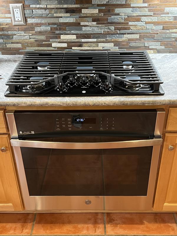 PGP7030DLBB in Black by GE Appliances in Bangor, ME - GE Profile™ 30  Built-In Gas Cooktop with 5 Burners and Optional Extra-Large Cast Iron  Griddle