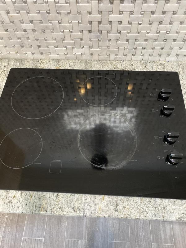 Most electric coil stove tops lift up to clean underneath : r/lifehacks