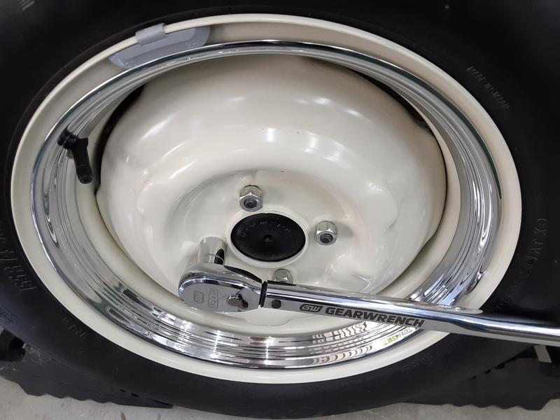 Checking wheel torque on the Morris Minor.