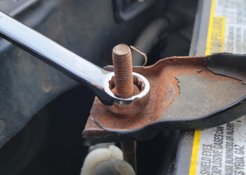 Solid contact with the 12-point box end and long pattern nature of the wrench allow for a greater natural feeling as I break loose a very stubborn rusty nut on the battery tie-down while also utilizing the 15-degree box end offset to my advantage.