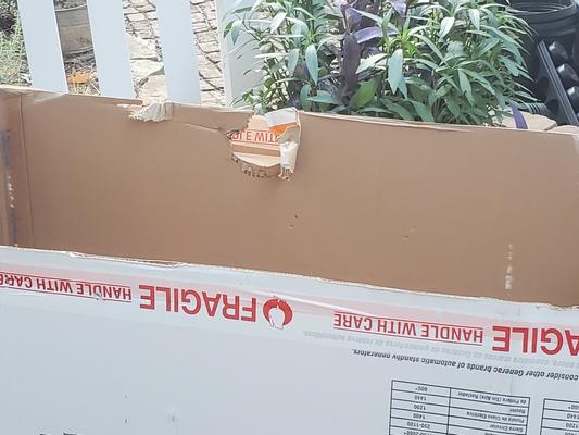 Taped over holes (bottom of box)