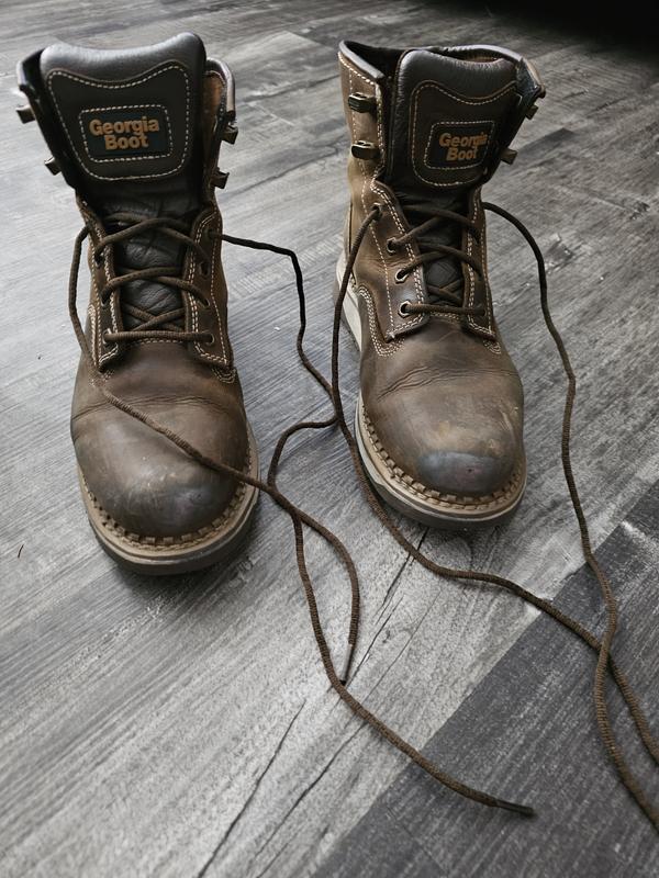 Leather breaks in very well almost to much. I don't have wide feet and you can see the outer sides of my feet around pinky toes was stretched out alot.  Which makes them very comfy but now feet slide to much