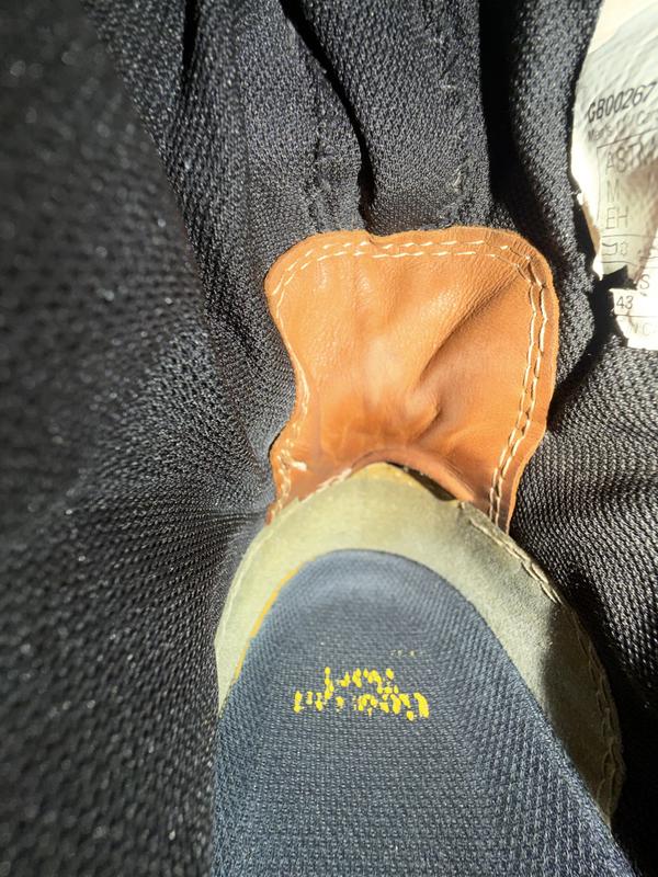 The whole bottom starting to crack and peel away, and the heel part is peeling and is extremely uncomfortable