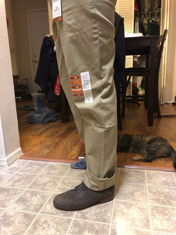 Khaki pair rolled to show the extra length