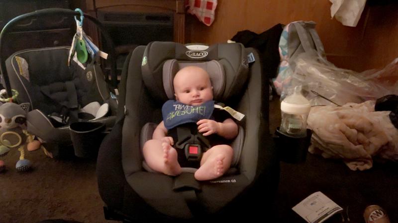 This was when we adjusted everything before placing it in are vehicle he’s is 25in so it holds him amazingly