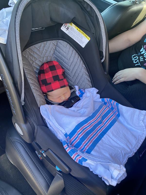 He is snug as a bug. Ready for his first car ride