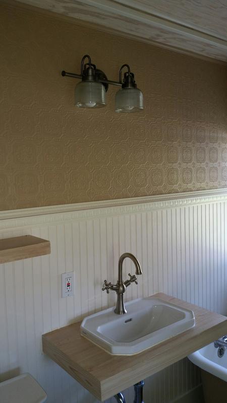 Updated guest bath with wallpaper
