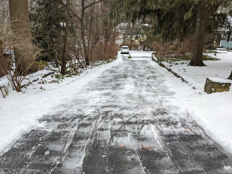 My Driveway including entrance where the town plow piled up snow